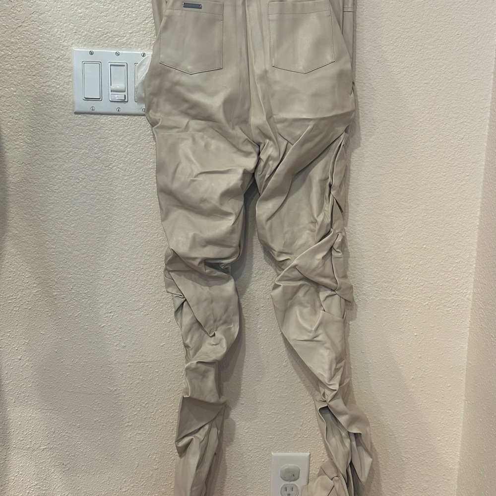 Maniere De Voir Tacked Vegan Leather Flared Trousers in beige - Picture 4 of 6